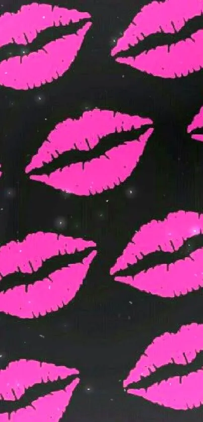 Vibrant pink lips on black wallpaper.