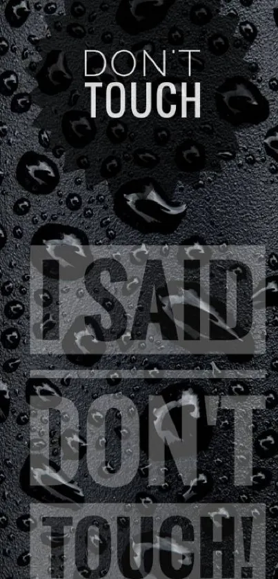 Black texturized wallpaper with 'Don't Touch' message and rain droplets.
