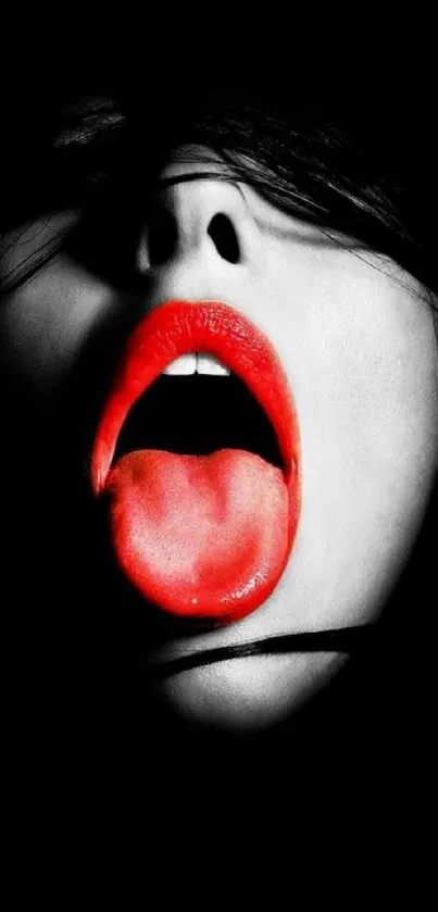 Vivid red lips on a black background.