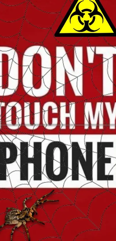 Red wallpaper with 'Don't Touch My Phone' text, spider web, and biohazard symbol.