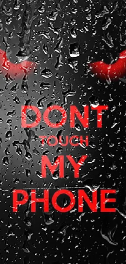 Black wallpaper with red text 'Don't Touch My Phone' for mobile.