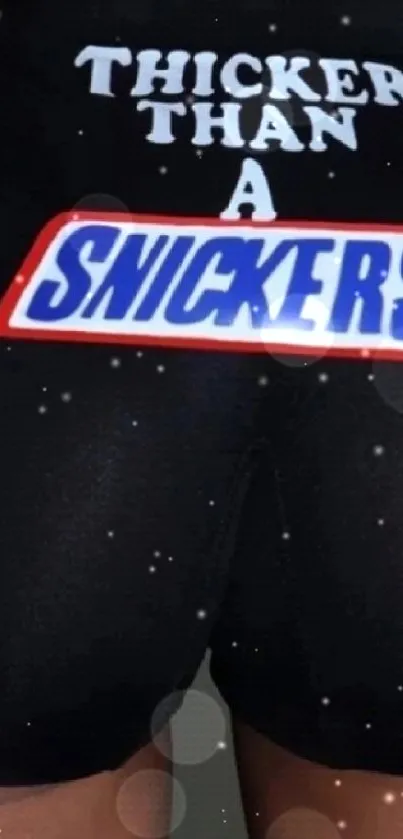 Wallpaper with bold 'Thicker Than a Snickers' text on black background.