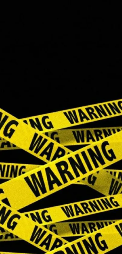 Yellow warning tape design on black wallpaper.