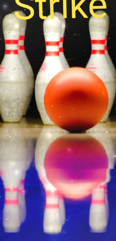 Bowling ball and pins in a striking formation on glossy lane.