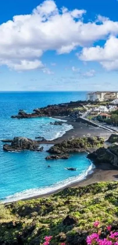 A stunning coastal view with blue ocean, green landscape, and vibrant pink flowers.