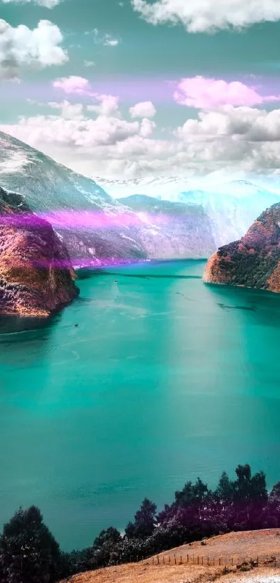 Turquoise lake amidst towering mountains and clouds.