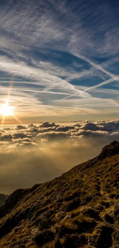 Sunrise over mountains with clouds and sky.