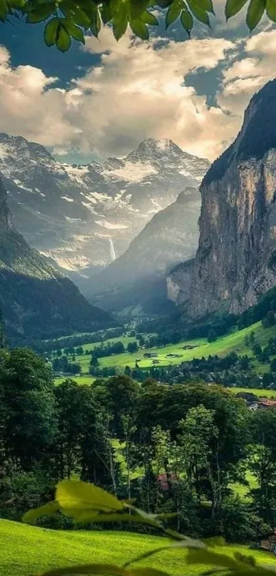 Breathtaking view of a lush green valley with mountains and a cloudy sky.