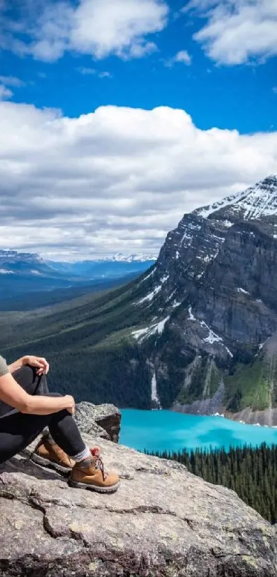 Woman admiring the mountain view with clear blue skies.