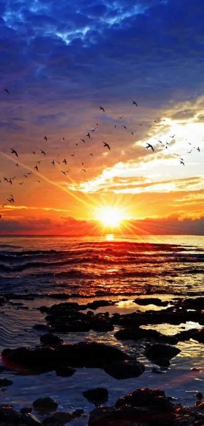 Vibrant ocean sunset with colorful sky and birds flying above serene waves.