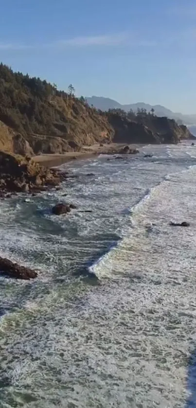 Majestic ocean view with rocky coastline and vibrant blue waves.