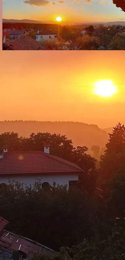 Vibrant orange sunset over village rooftops with trees and distant hills.