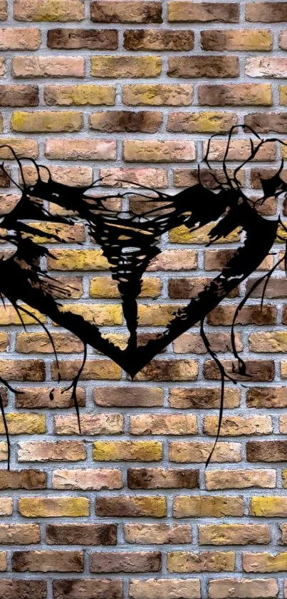 Black heart design on a rustic brick wall wallpaper.