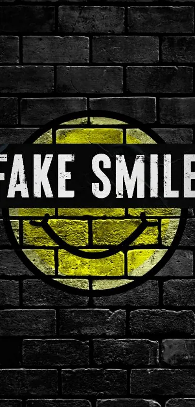 Fake smile on a brick wall with yellow smiley.