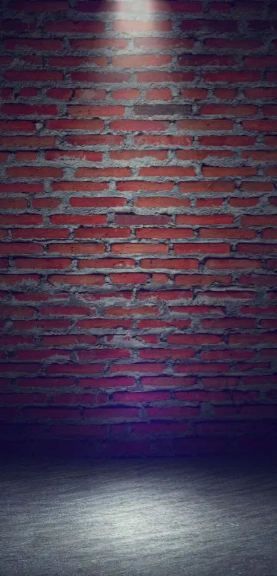 Red brick wall with a spotlight in a dark room setting.