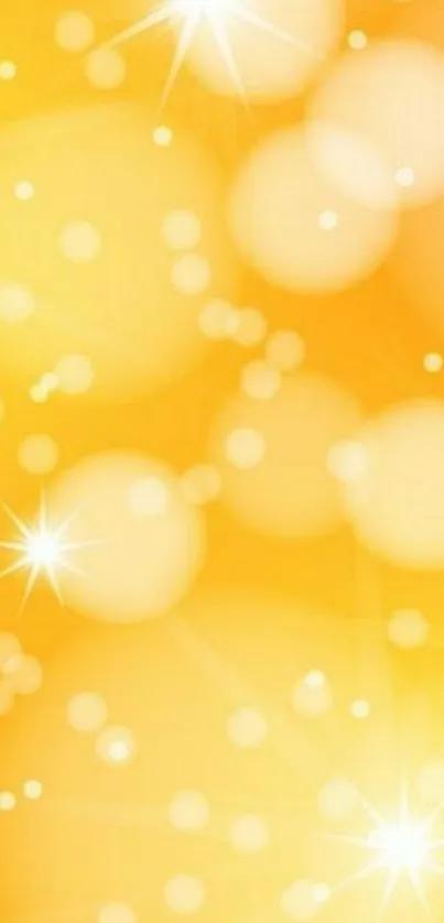 Bright yellow bokeh wallpaper with starbursts