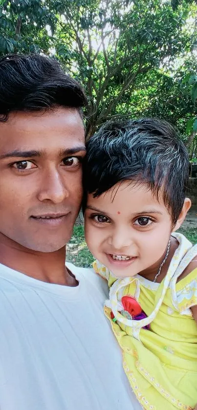 Happy father and daughter in a lush park setting.