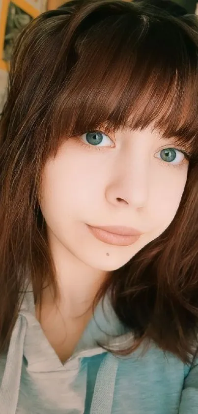 Young woman with blue eyes and brown hair