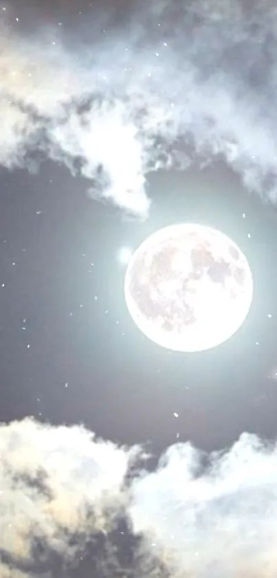 Luminous full moon and clouds in night sky.