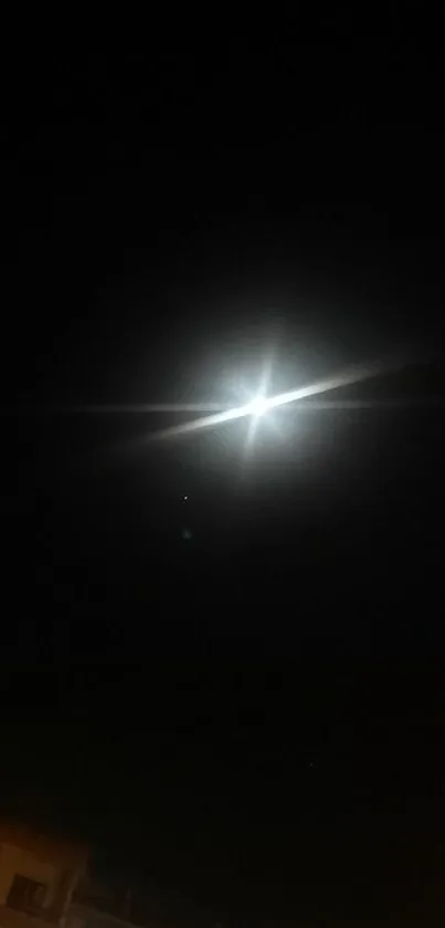 Bright moon in a clear dark night sky with a serene ambiance.