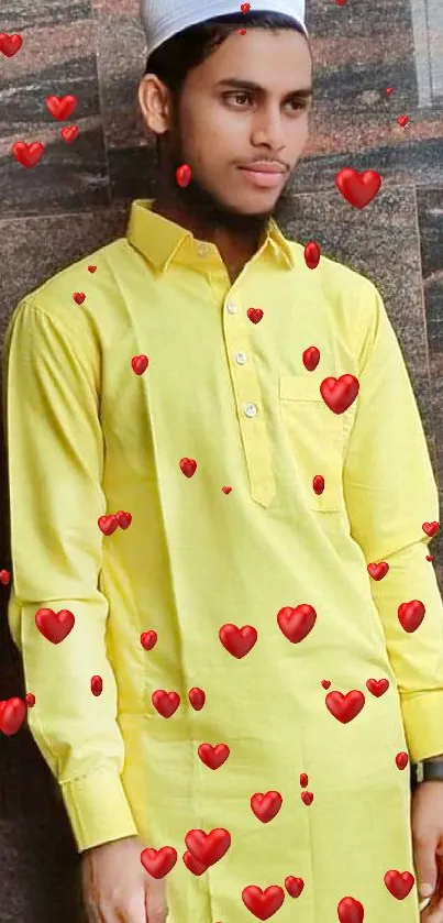 Man in bright yellow traditional outfit on balcony.