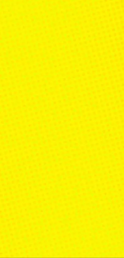 Bright yellow dotted wallpaper for mobile.