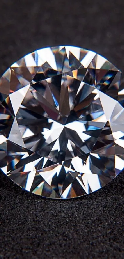 Close-up of a sparkling diamond on a dark surface.