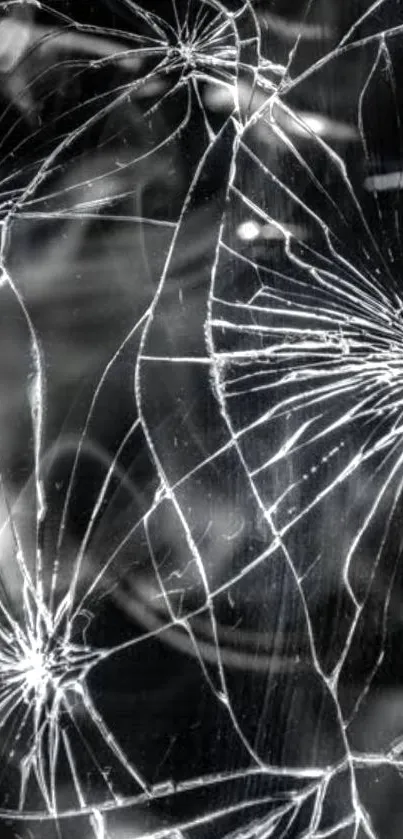 Intricate broken glass pattern on a black background wallpaper.