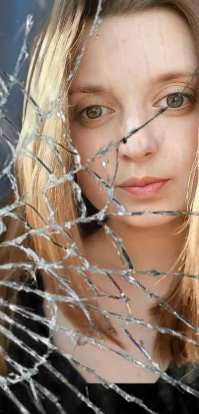 Artistic portrait with cracked glass effect on mobile wallpaper.