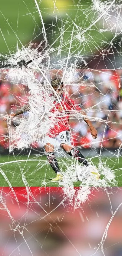 Soccer player with broken glass graphic effect on a lush green field.