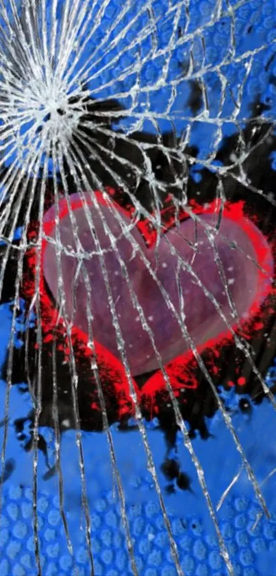 Broken heart on vivid blue background with shattered effect.