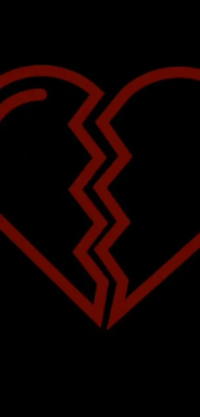 Red broken heart on a black background wallpaper.