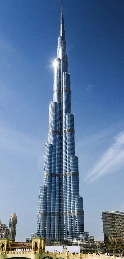 Burj Khalifa towering over the Dubai skyline under a clear blue sky.