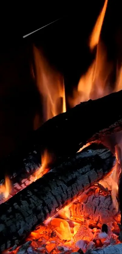 Orange flames and burning logs create a warm, cozy atmosphere in a fireplace setting.