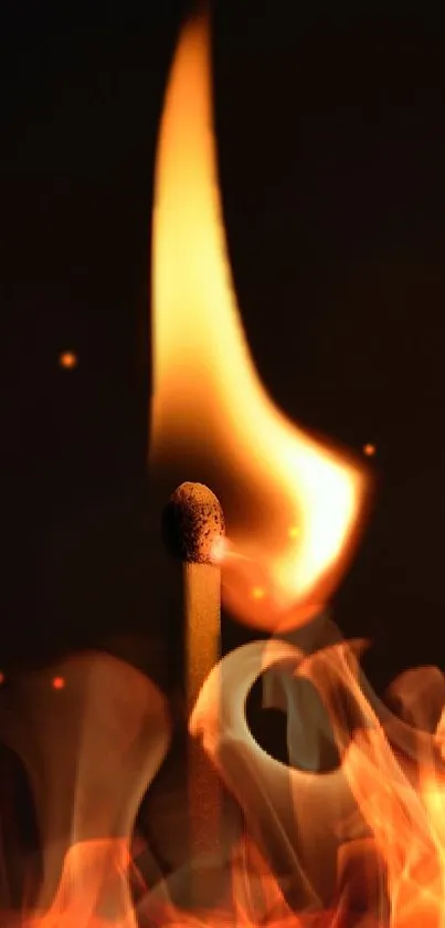 Close-up of a burning match flame against a dark background.