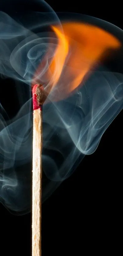 Vivid mobile wallpaper featuring a burning matchstick with swirling smoke on a dark background.