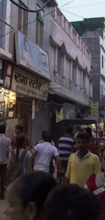 Vibrant urban street scene with people and shops at dusk.