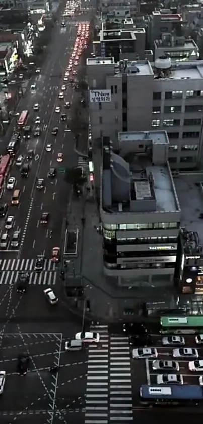 Aerial view of busy city street at dusk.