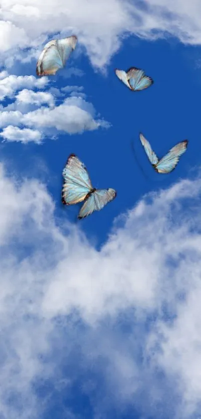 Butterflies soar through a bright blue sky with fluffy white clouds.