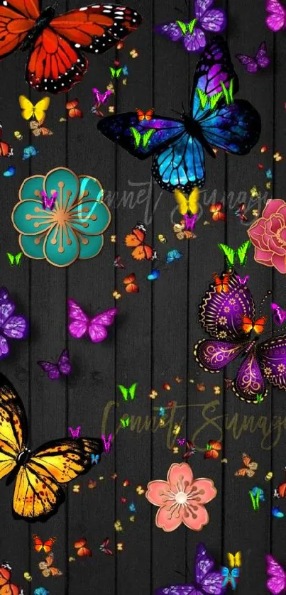 Colorful butterflies and flowers on black wood wallpaper.