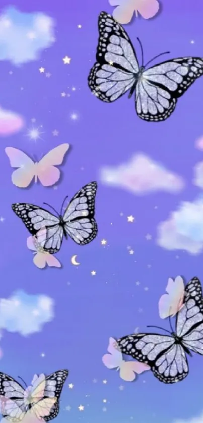 Dreamy butterflies with stars in a purple sky wallpaper.