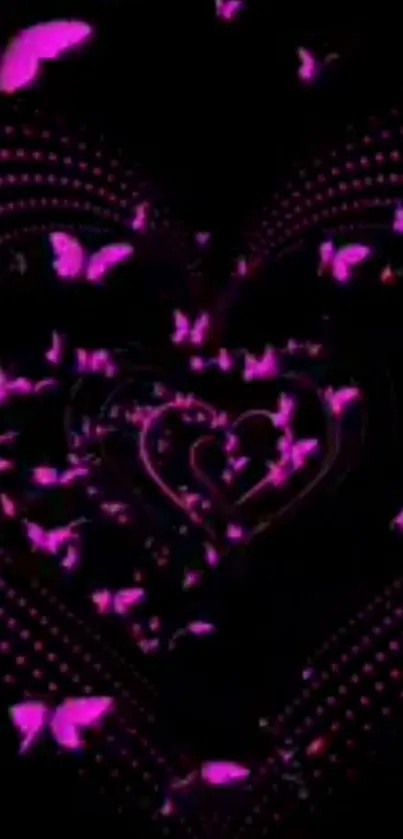 Neon pink butterflies forming a heart on black background.