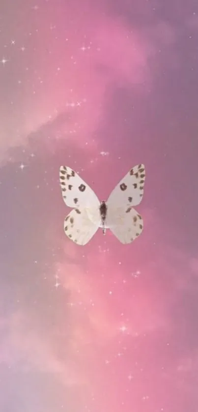 Whimsical butterfly in a pink sky with dreamy clouds wallpaper