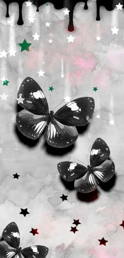 Monochrome butterflies with stars and black drips on a gray background.