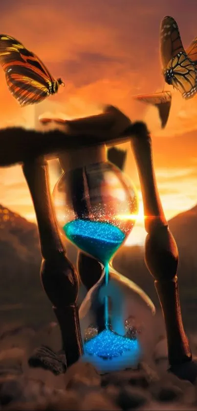 Hourglass with blue sand and butterflies at sunset.