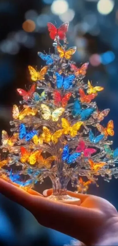 A magical butterfly tree held in a hand with vibrant colors.