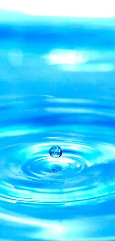 Serene blue water ripple wallpaper with a central droplet.