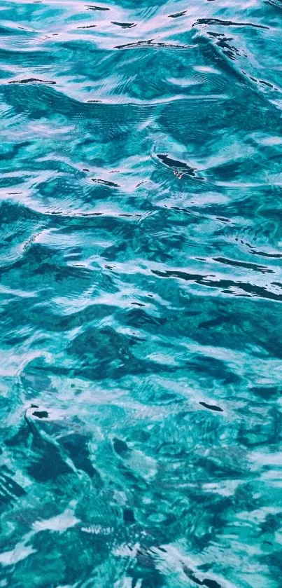 Turquoise ocean waves mobile wallpaper with calming sea texture.