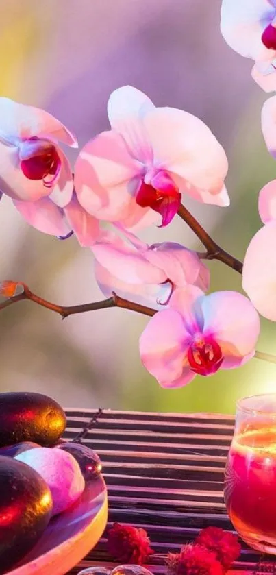 Mobile wallpaper with orchids and candle in a spa setting.