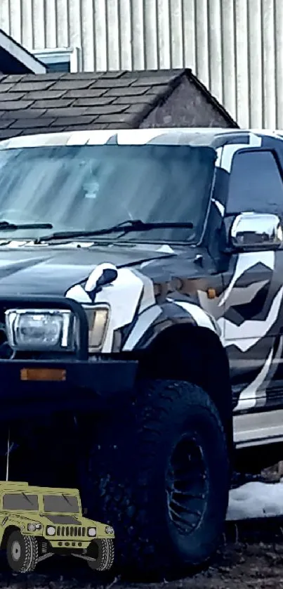 Camouflage pickup truck parked in a suburban backyard.